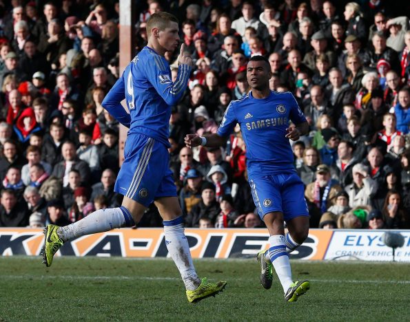 Chelsea's Torres celebrates his goal against Brentford with team mate Cole during their FA Cup fourth round soccer match at Griffin Park in London
